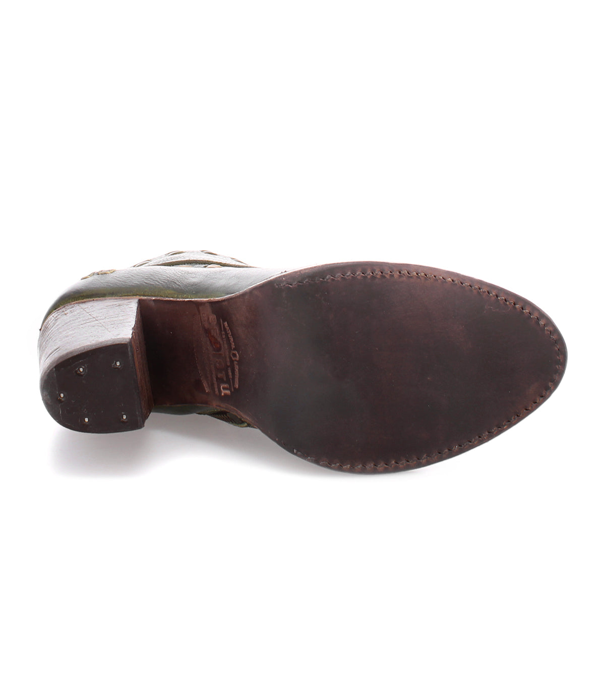 The image displays the sole of the Bed|Stü Yuno leather dress shoe, which features a dark brown finish, visible edge stitching, and small heel nails. Subtle contrasting leather accents add sophistication to its classic design.