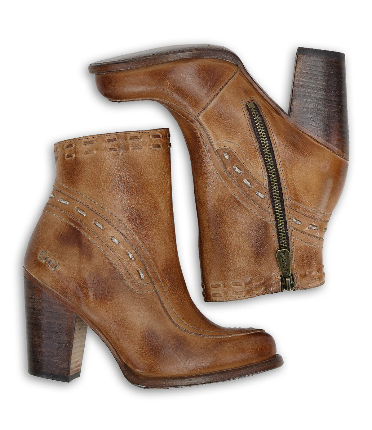 Showcased from both the outer and inner sides against a white background, the Bed|Stü Yuno boots are a pair of brown leather elevated heel boots with side zippers, decorative stitching, and contrasting leather accents.