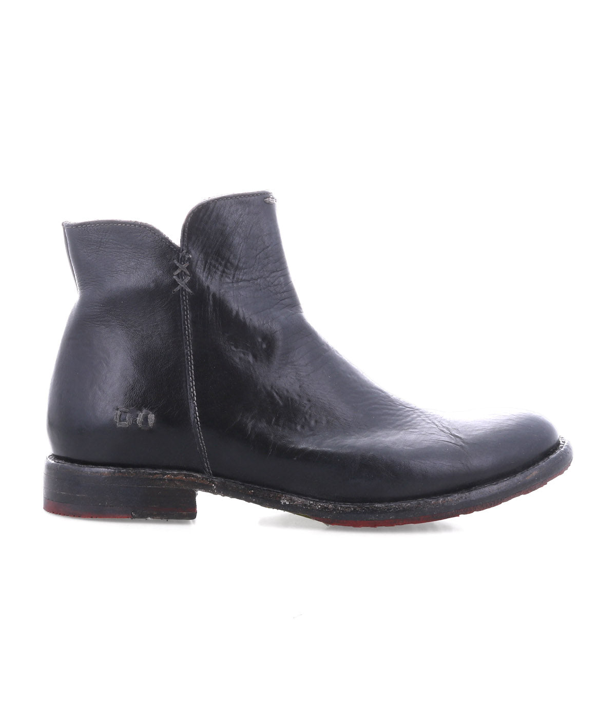 The Yurisa ankle boot by Bed|Stü features handcrafted black leather, a rounded toe, low heel, and visible stitching detail, shown from the side against a white background.
