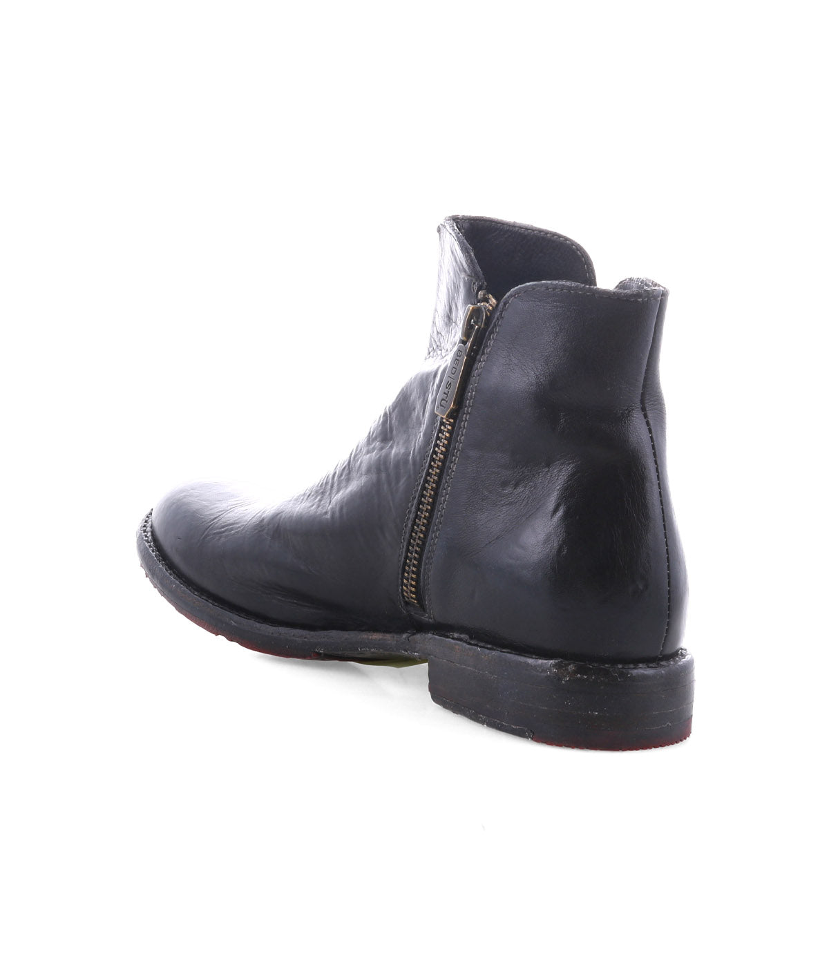 The Yurisa ankle boot by Bed|Stü, handcrafted from black leather and featuring a side zipper, is displayed from a rear angle against a white background.