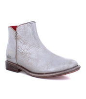 A single Yurisa ankle boot by Bed|Stü, crafted in worn gray leather with a low heel, visible creases, a side zipper, and a slightly scuffed leather outsole, is displayed against a white background.