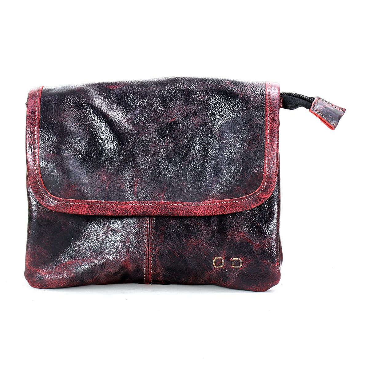 The Ziggy by Bed|Stü is a dark brown clutch crafted from supple leather, featuring a flap closure and distinctive red-tinted edges. Displayed against a white background, this versatile accessory can also be styled as a crossbody bag for hands-free convenience.